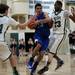 Pioneer senior Jibreel Hussein drives to the rim against Father Gabriel Richard defenders on Tuesday. Daniel Brenner I AnnArbor.com